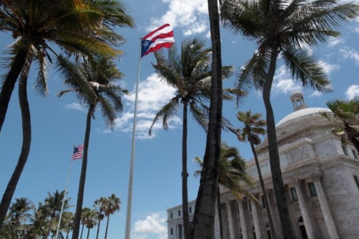       Deal reached to cut bankrupt  Puerto Rico’s debt by $24 billion   