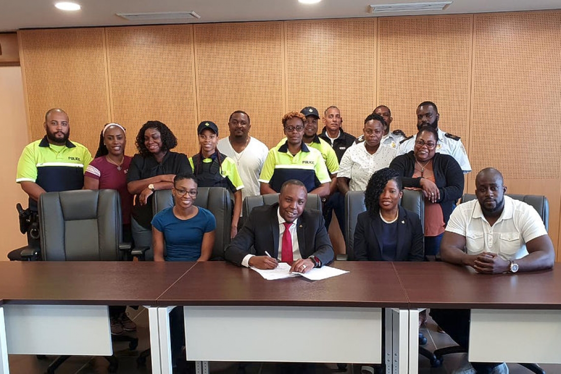       Doran signs settlement  for 24 police personnel   