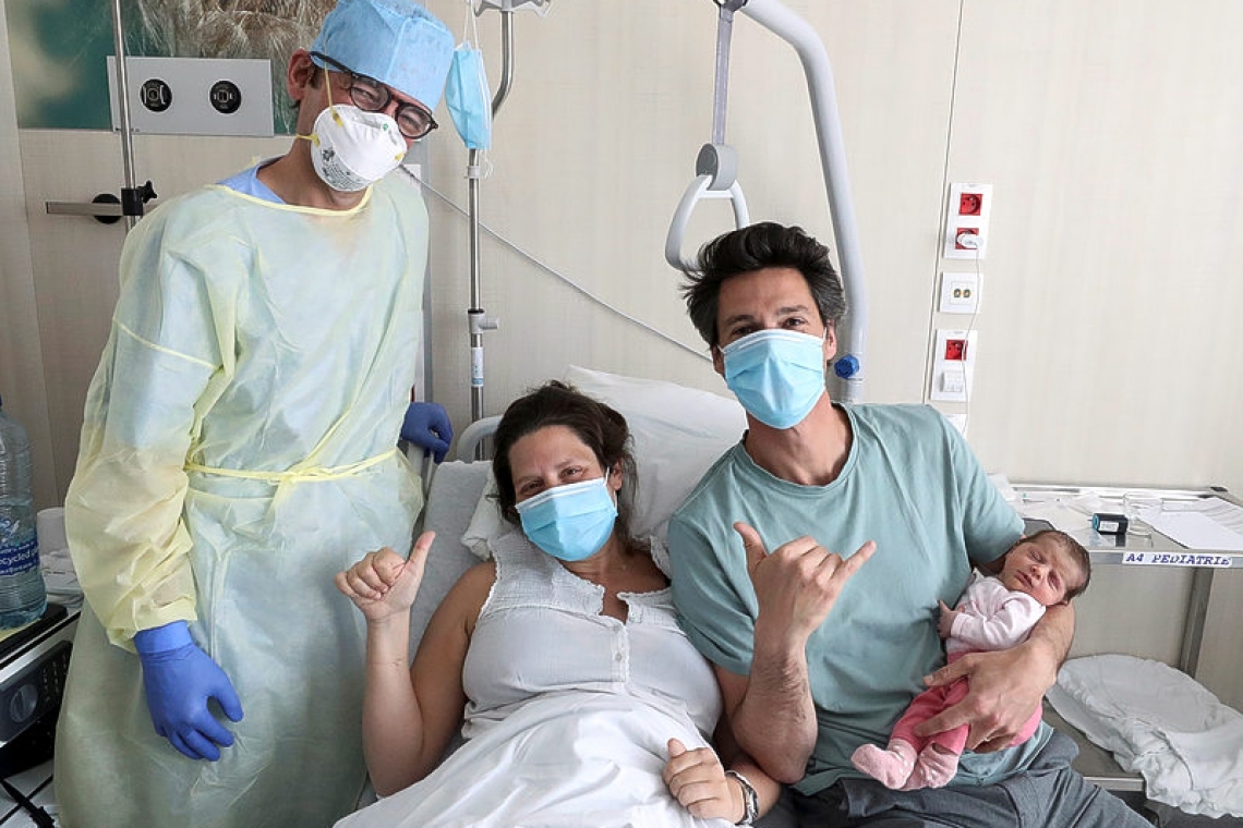 Mothering with a mask: Belgian with COVID-19 gives birth to healthy baby