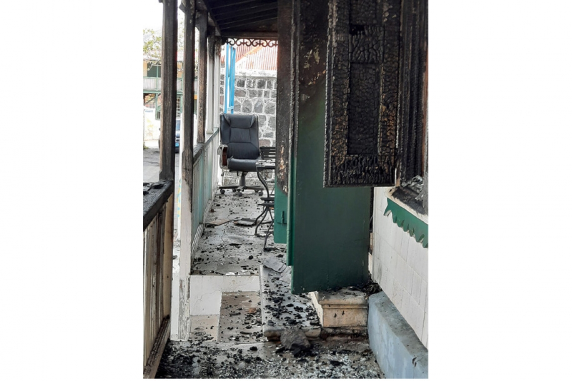 Chair, table only things standing in wake of Statia Tourist Office fire