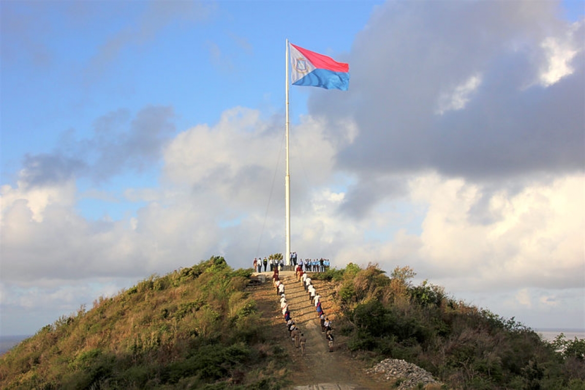 PM, Minister Samuel call for Flag Day celebration in midst of COVID recovery