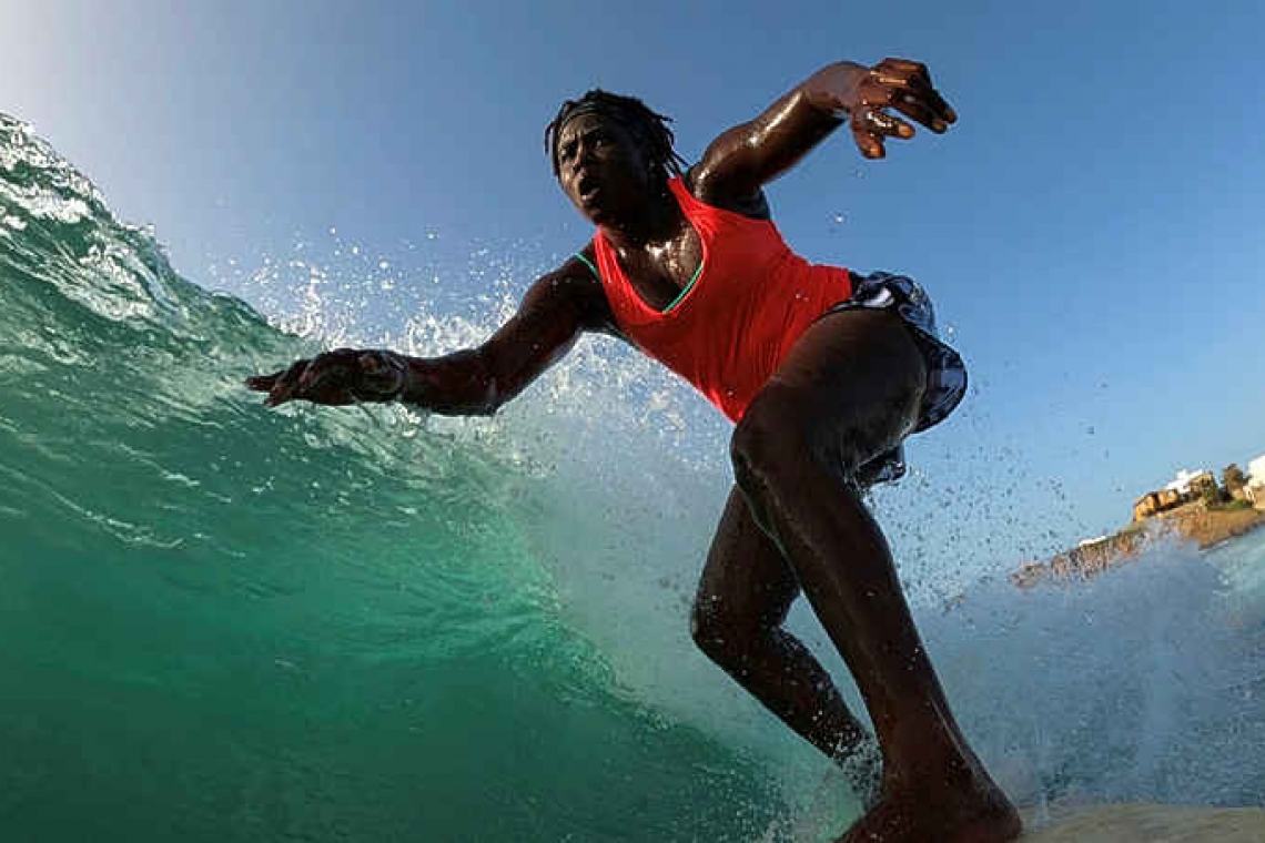 Senegal's first female pro surfer  draws others in her wake