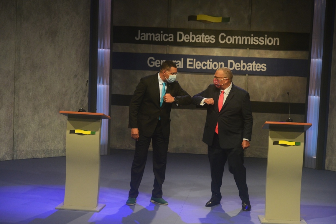    Holness, Phillips end  debate on high note   