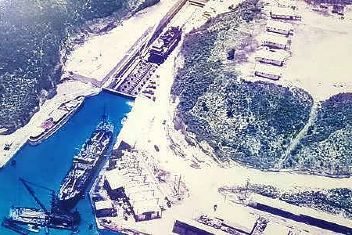 Modern shipyard repairs  ships at Ozama River bank