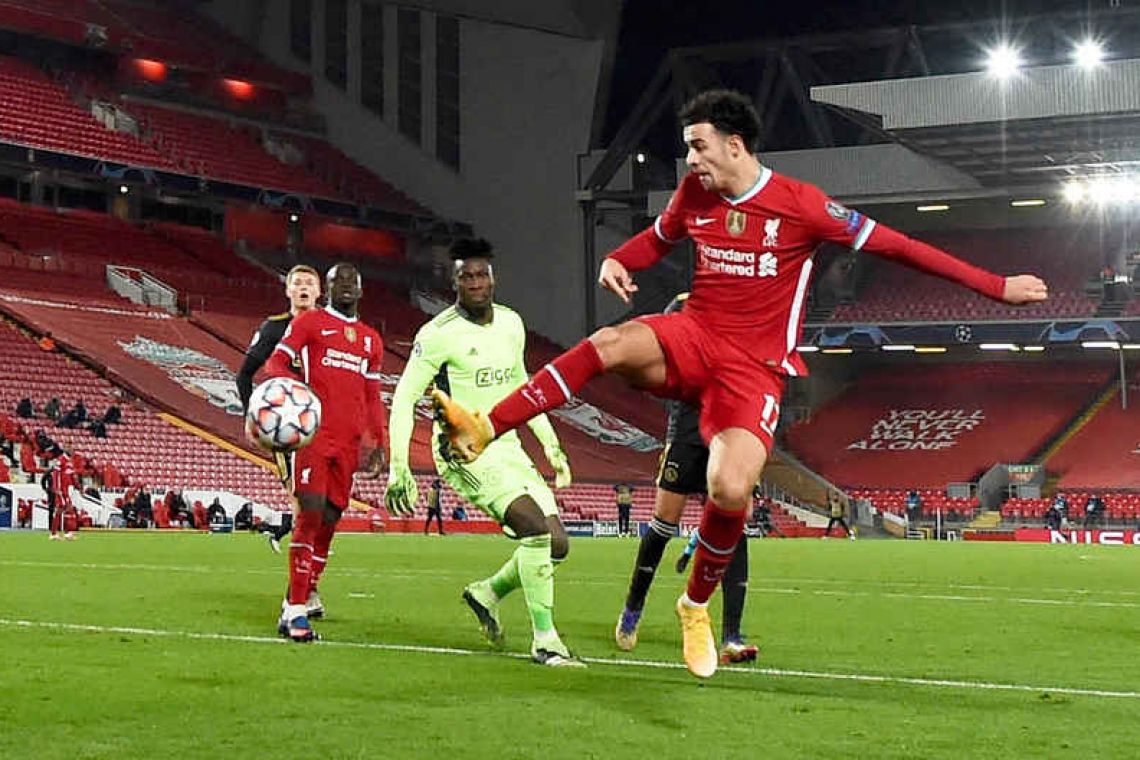 Jones seals progress for depleted Liverpool with win over Ajax