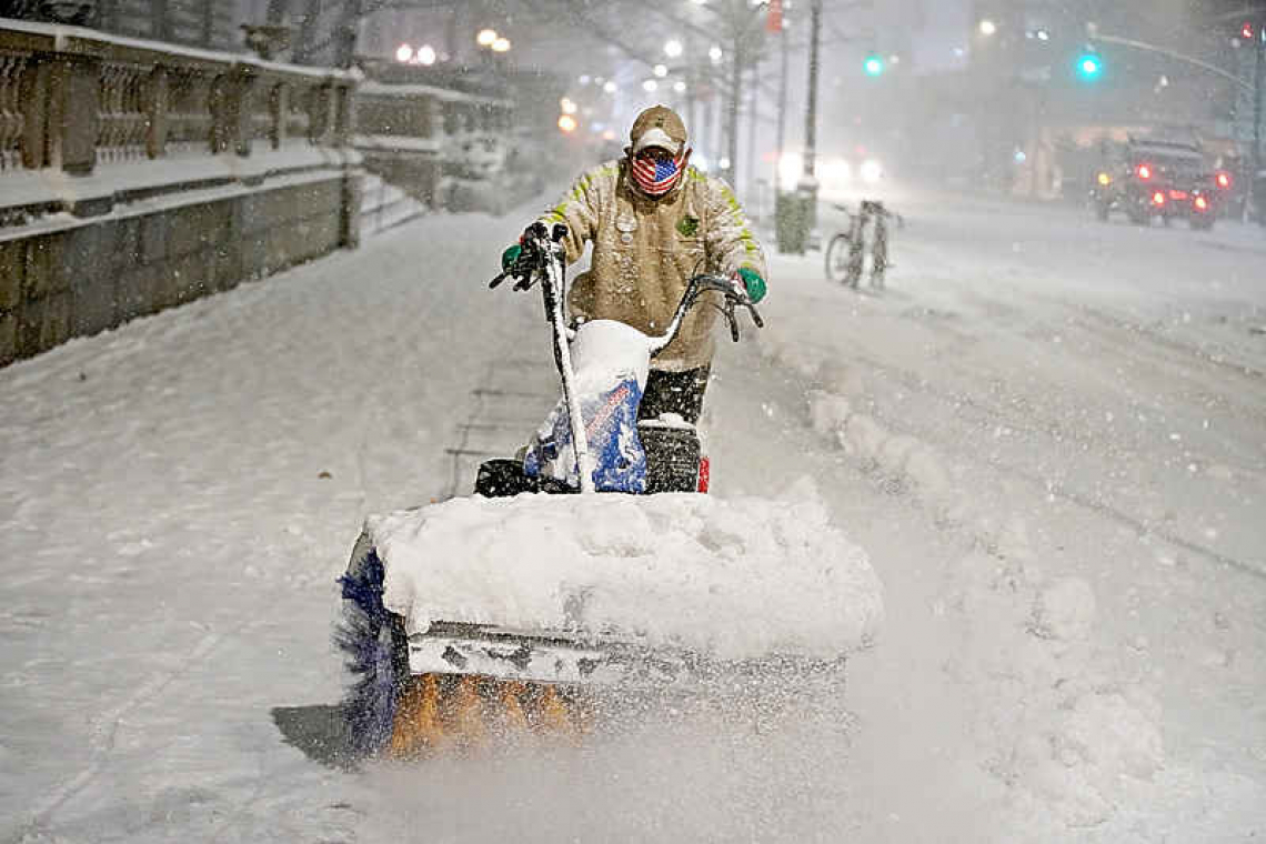 Winter storm wallops Northeast, but some schools bury snow days