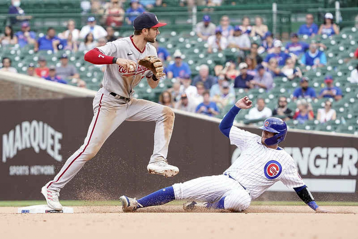 Ian Happ homers twice as Cubs beat Nationals 5-2