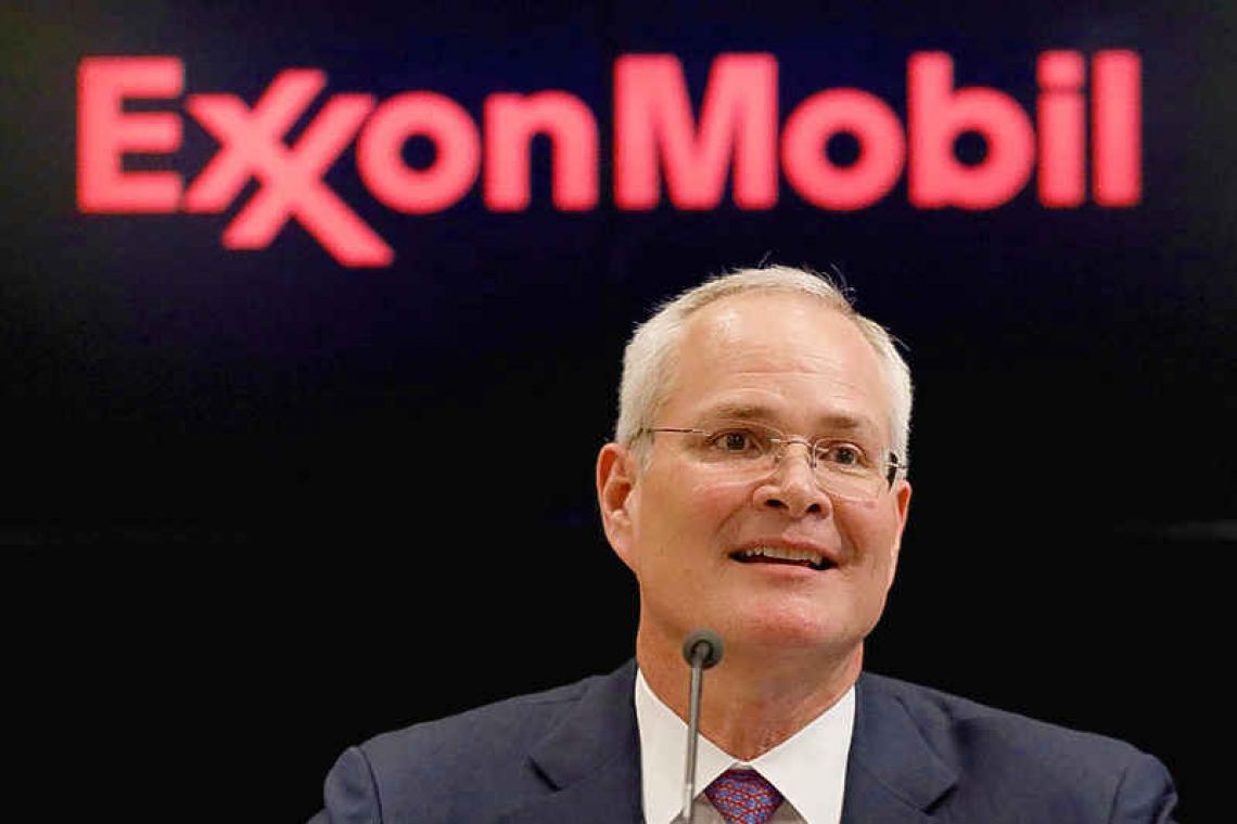 Exxon loses board seats to activist hedge fund in historic climate vote