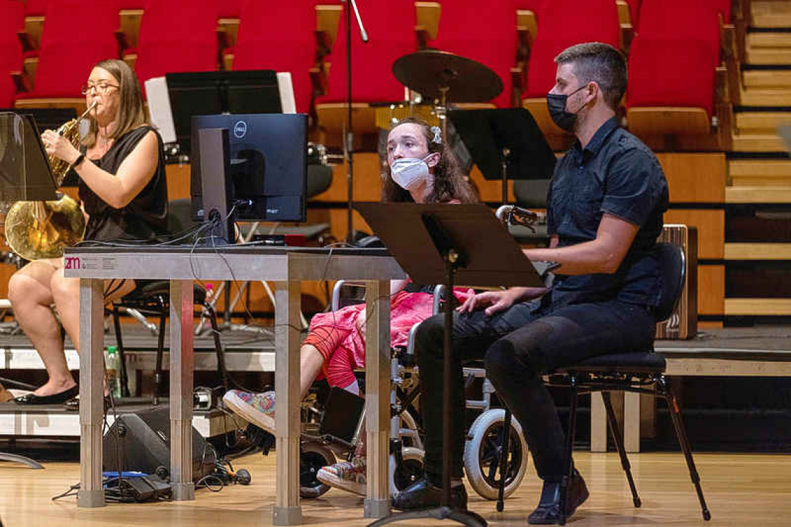 Technology helps disabled Greek student play the harp with her eyes