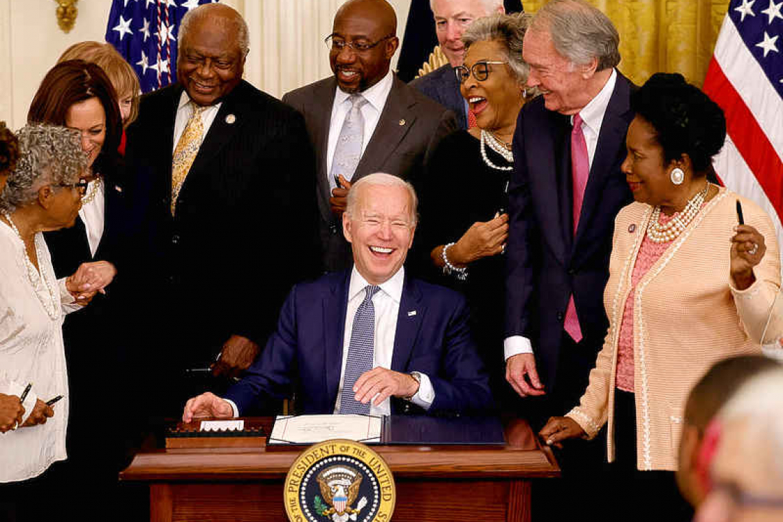 Biden signs Juneteenth bill, creating holiday marking end to US slavery