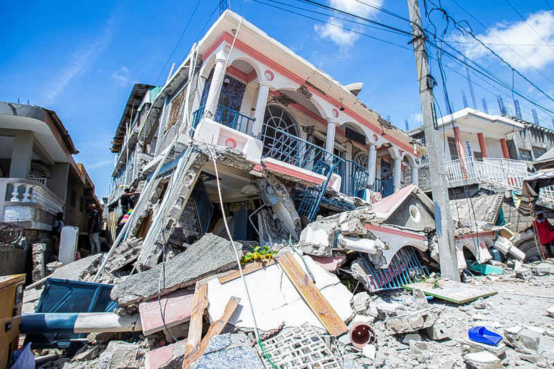 Rescuers race to find Haiti quake  survivors as death toll hits 1,297