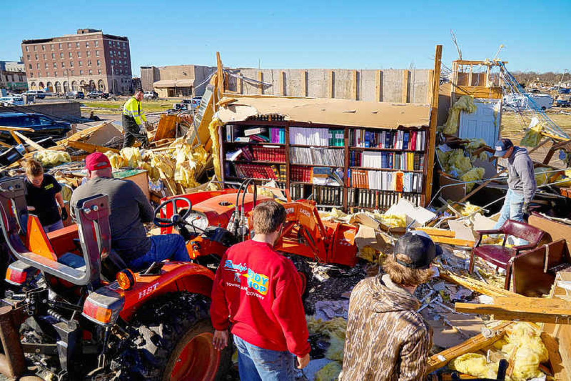   Kentucky tornado survivors claw through debris