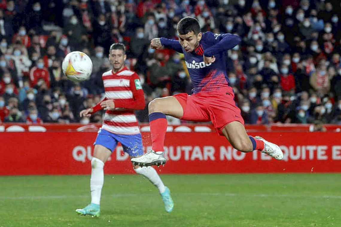 Granada hand champions Atletico fourth successive LaLiga defeat 2-1