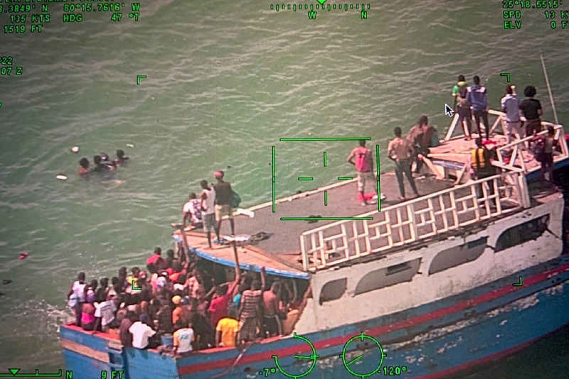 Boat packed with hundreds of Haitian  migrants runs aground in Florida