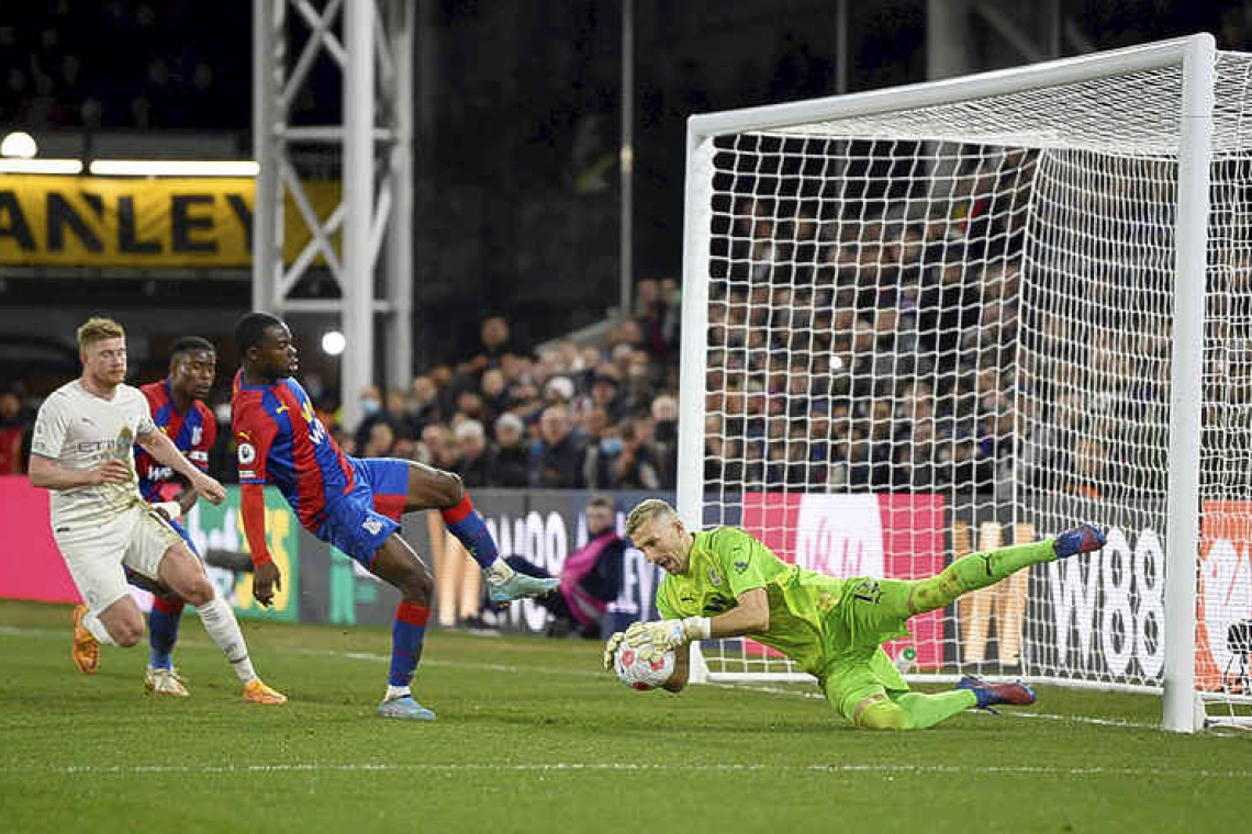 Leaders Man City drop points at Palace to open door for Liverpool