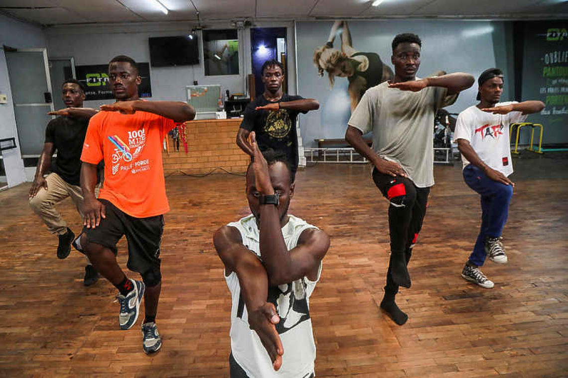 Ivory Coast's 'Real Boys' address drug use, violence through dance