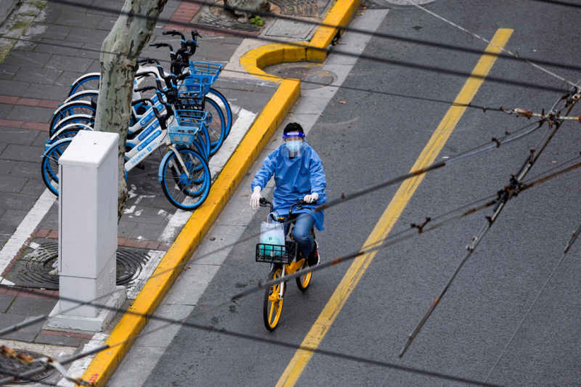 Whole of Shanghai in lockdown despite lower symptomatic cases