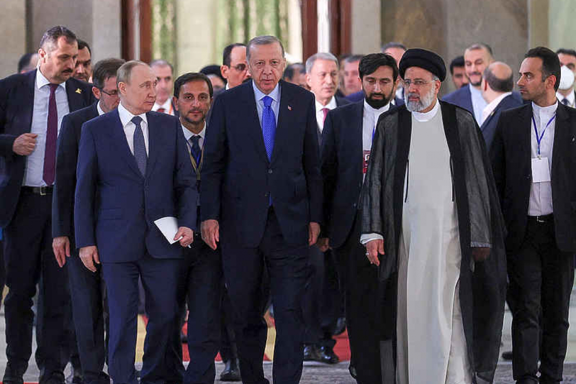 Putin forges ties with Iran's supreme leader in Tehran talks