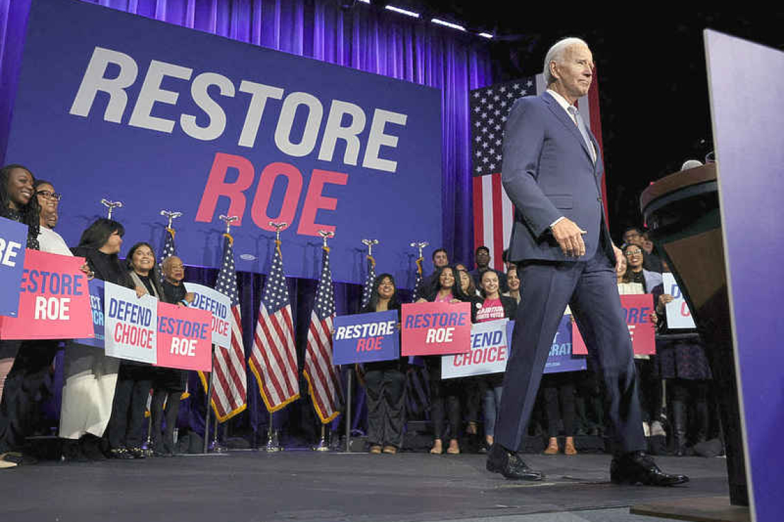 Biden pledges law on abortion rights