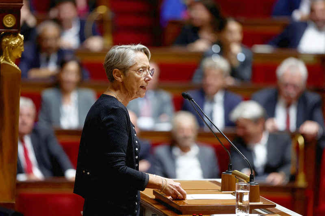 French government pushes budget past MPs with special constitutional powers