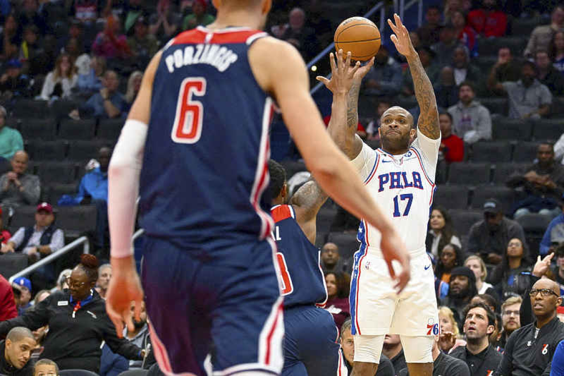 76ers use third-quarter burst to handle Wizards