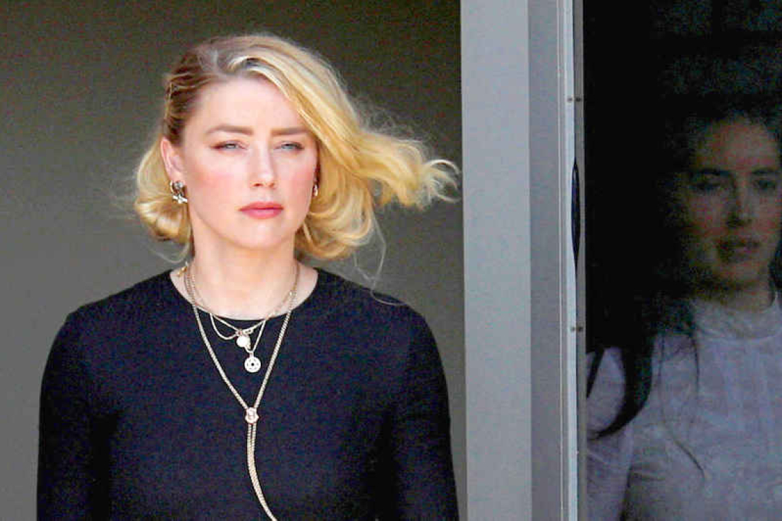 Amber Heard to settle defamation case with ex-husband Johnny Depp