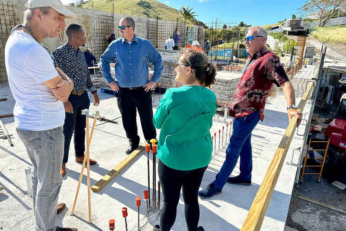 Officials tour construction  site Sacred Heart School