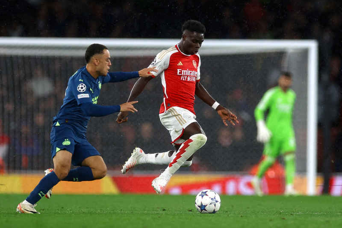 Arsenal thrash PSV on Champions League return