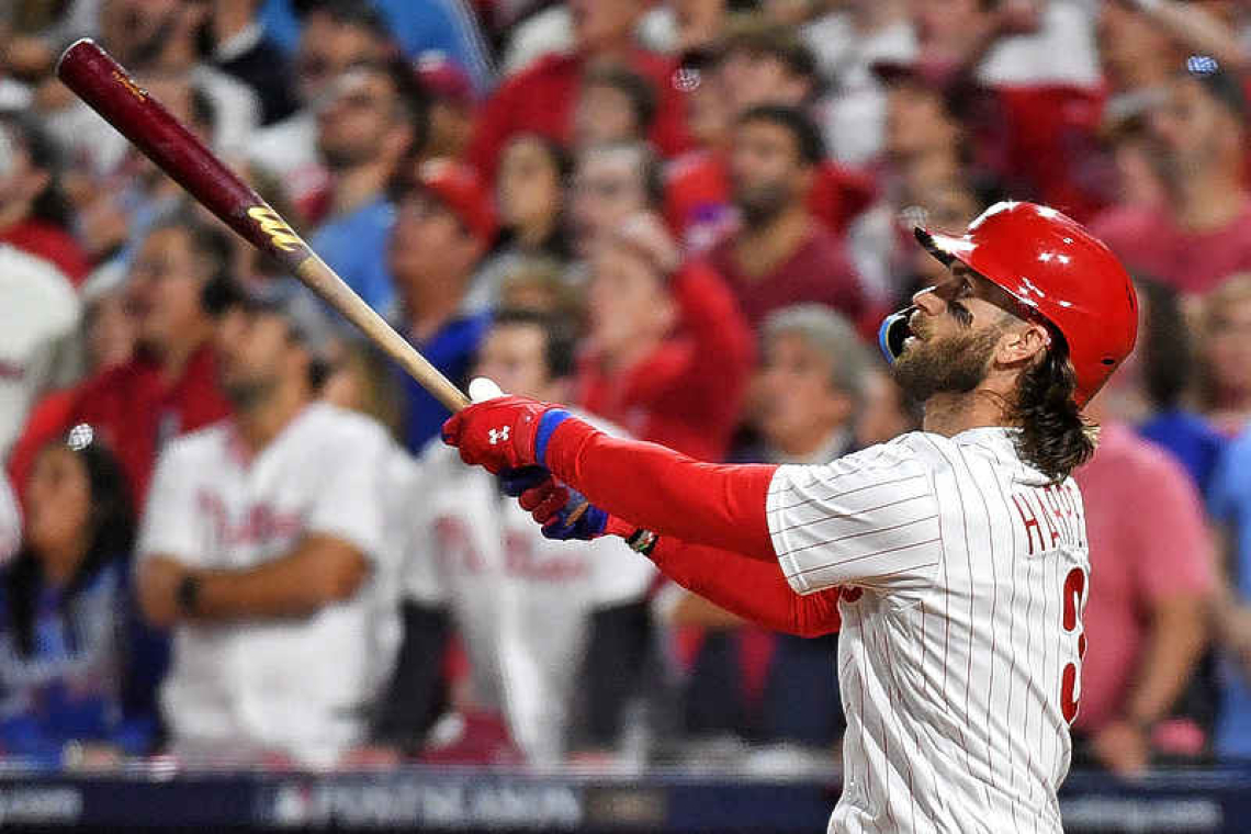 Phillies use power display to club Braves, take 2-1 lead in NLDS 