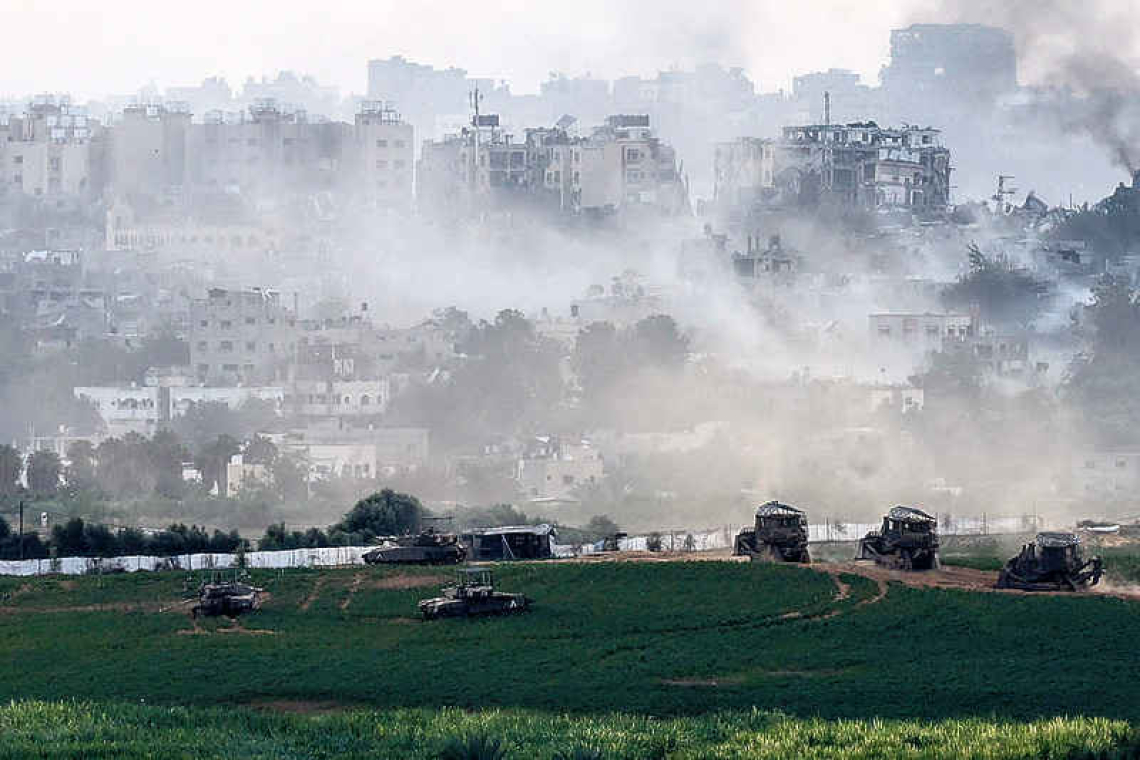 Israel shows images of tanks in Gaza as war on Hamas militants deepens