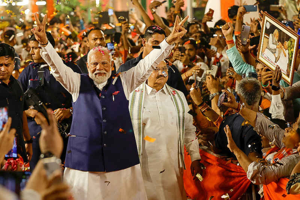 Modi set to win historic third term but with surprisingly slim majority