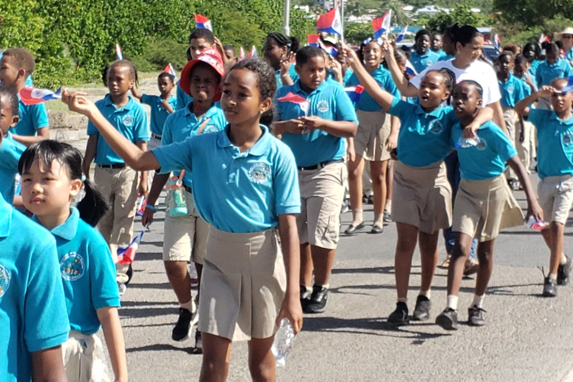 Three primary schools unite for Flag Day celebration in patriotic display