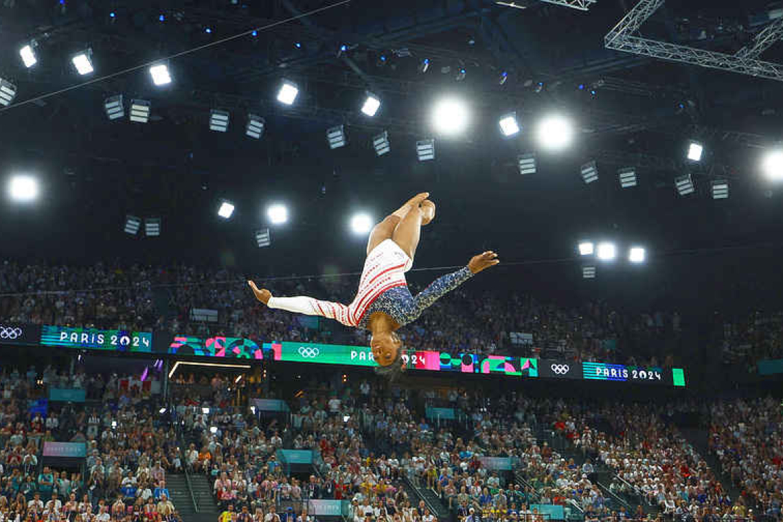 Triumphant Biles leads U.S. to gymnastics team gold