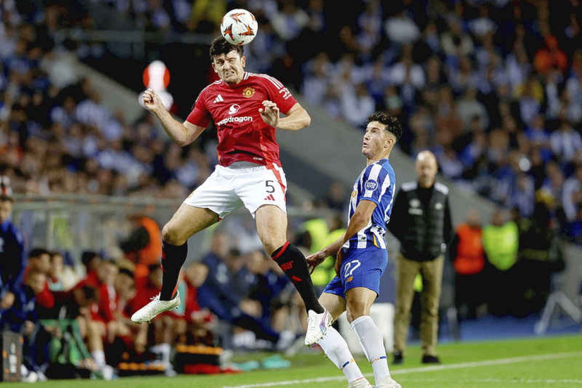 Maguire's late header earns Man United 3-3 draw at Porto