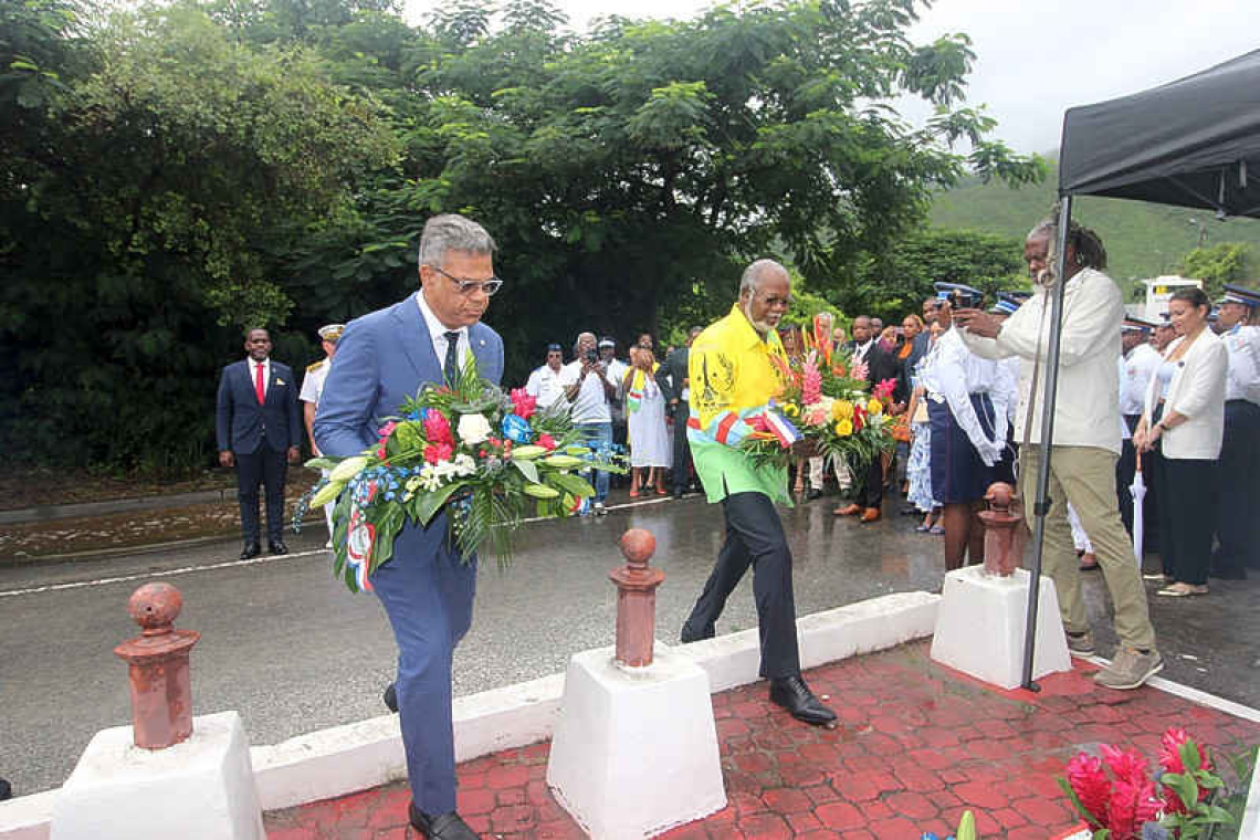 Rain fails to dampen spirits at official ceremonies  for St. Martin/St. Maarten Day in French Quarter