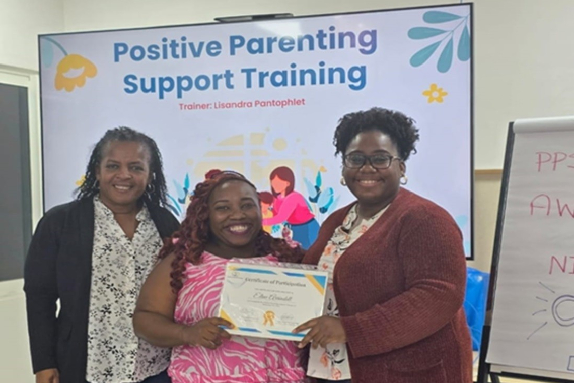 J&IS celebrates parent graduating in  Positive Parenting Support Program