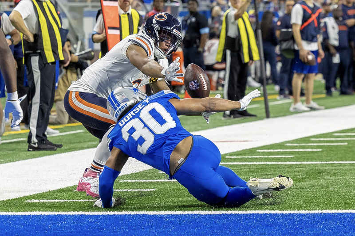      Lions win 10th straight game as Bears mismanage clock