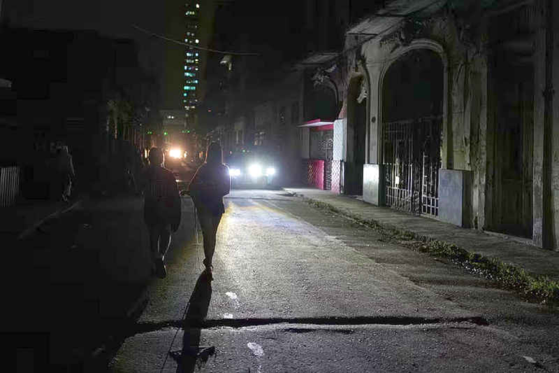       Cuba power grid back online  but many still without current