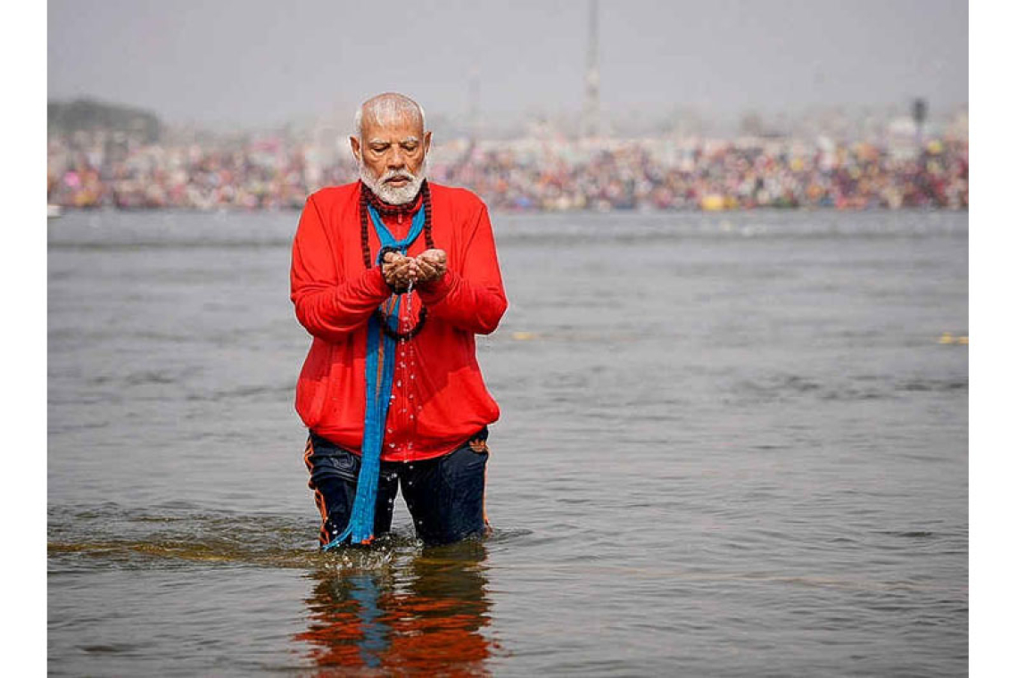 Modi takes 'holy dips' at festival, week after stampede killed dozens