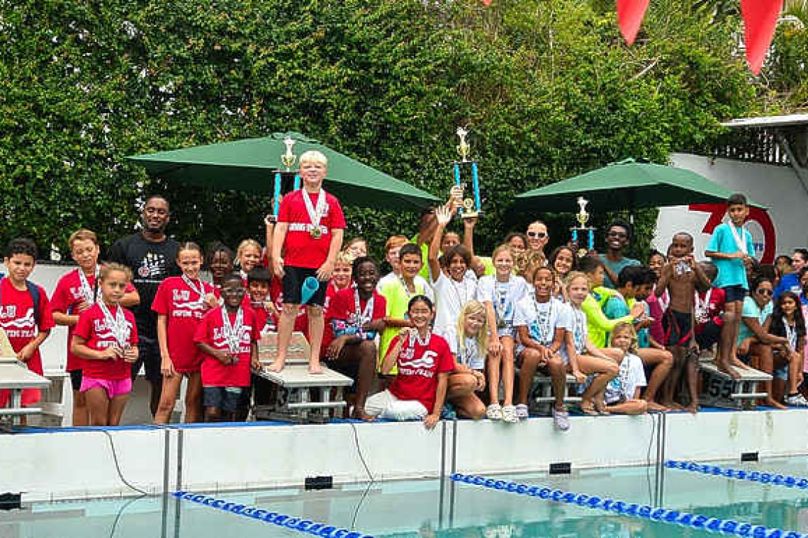    Caribbean International Academy  dominates Interscholastic Swim Meet