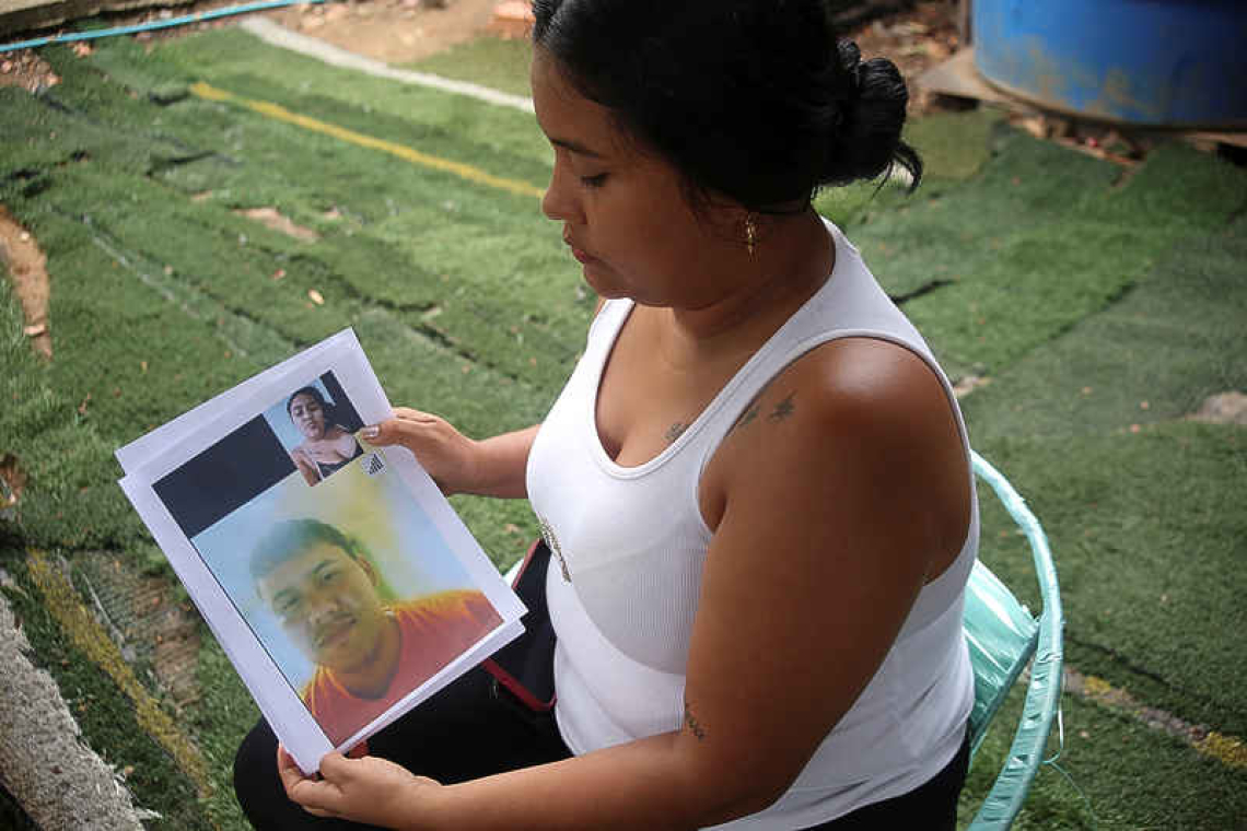 Colombian-Venezuelan migrant held in  El Salvador has no ties to gang, wife says